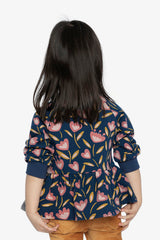Child wearing Deux par Deux blue tulip print French terry top, lookbook view 4