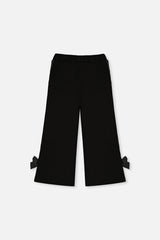 Back view of the Deux par Deux black flare-leg milano pants