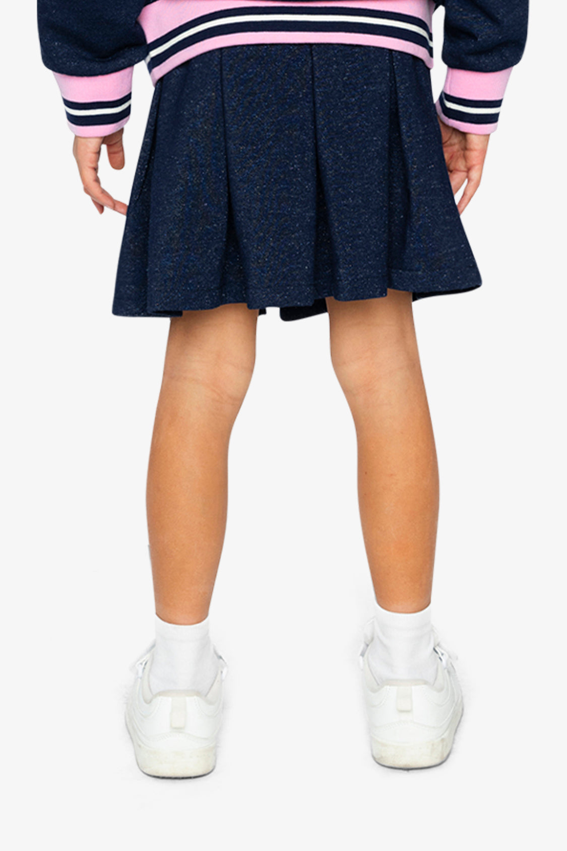 Child wearing the Pleated French Terry Skirt Navy Blue Denim, back view