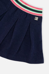 Close-up of the Pleated French Terry Skirt Navy Blue Denim striped elastic waistband and pleats