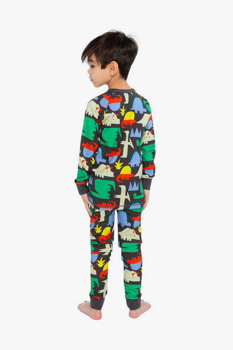 Child wearing the Deux par Deux black dinosaur print organic cotton pajama set, lookbook photo 3
