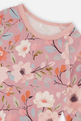 Close-up detail of the pink floral print organic cotton pajama set by Deux par Deux