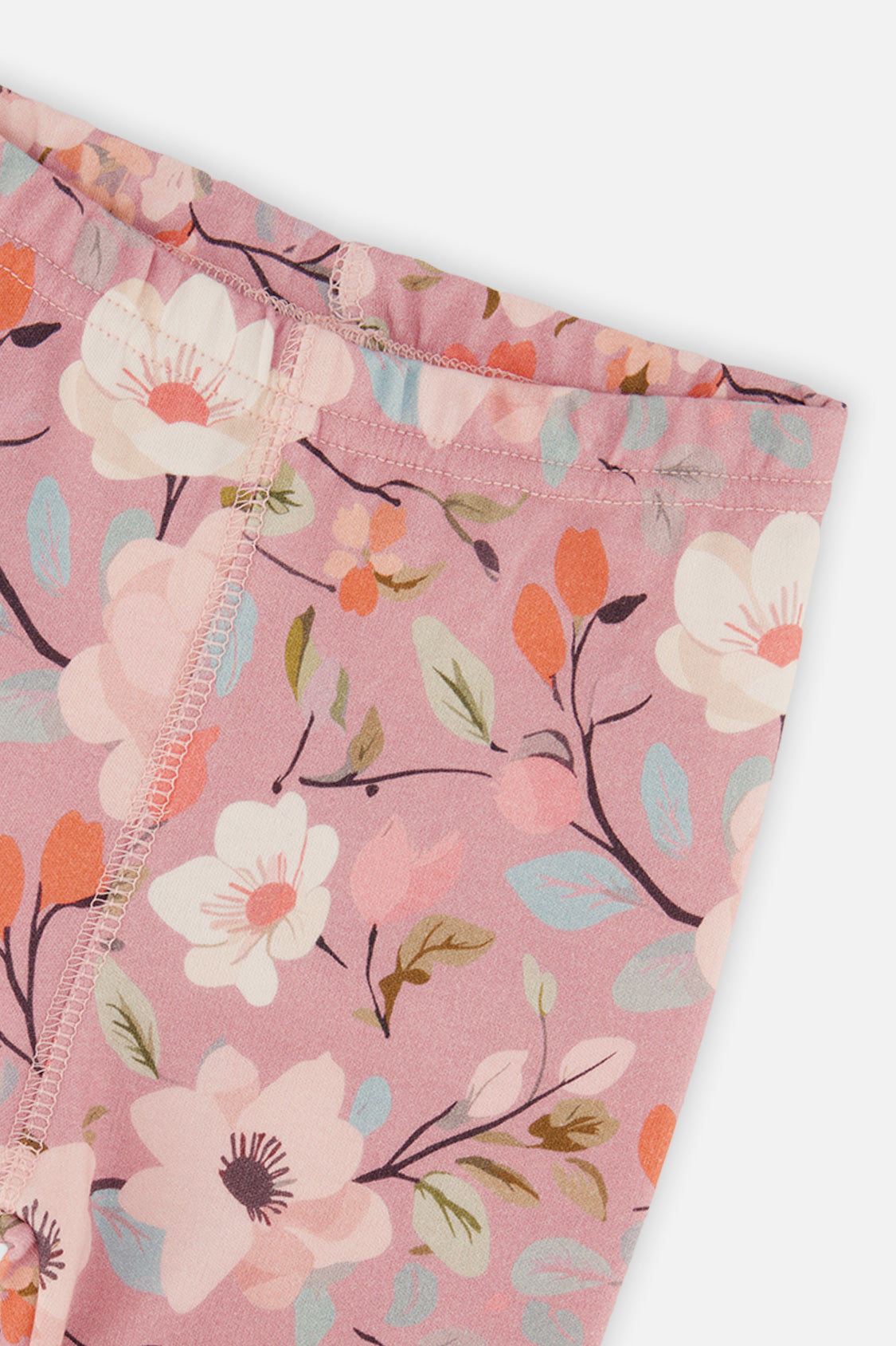 Second close-up detail of the pink floral print organic cotton pajama set by Deux par Deux