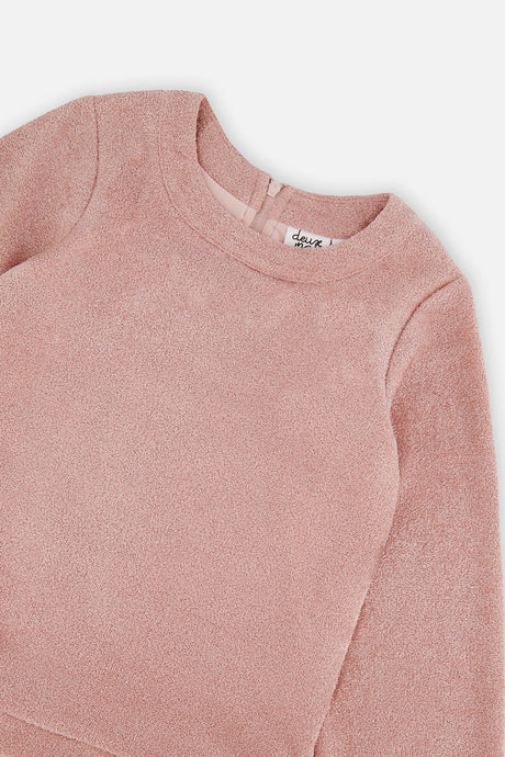 Close-up of the dusty pink knit neckline and sleeve on the Deux par Deux party dress