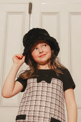 Child wearing the Deux par Deux black faux fur bucket hat