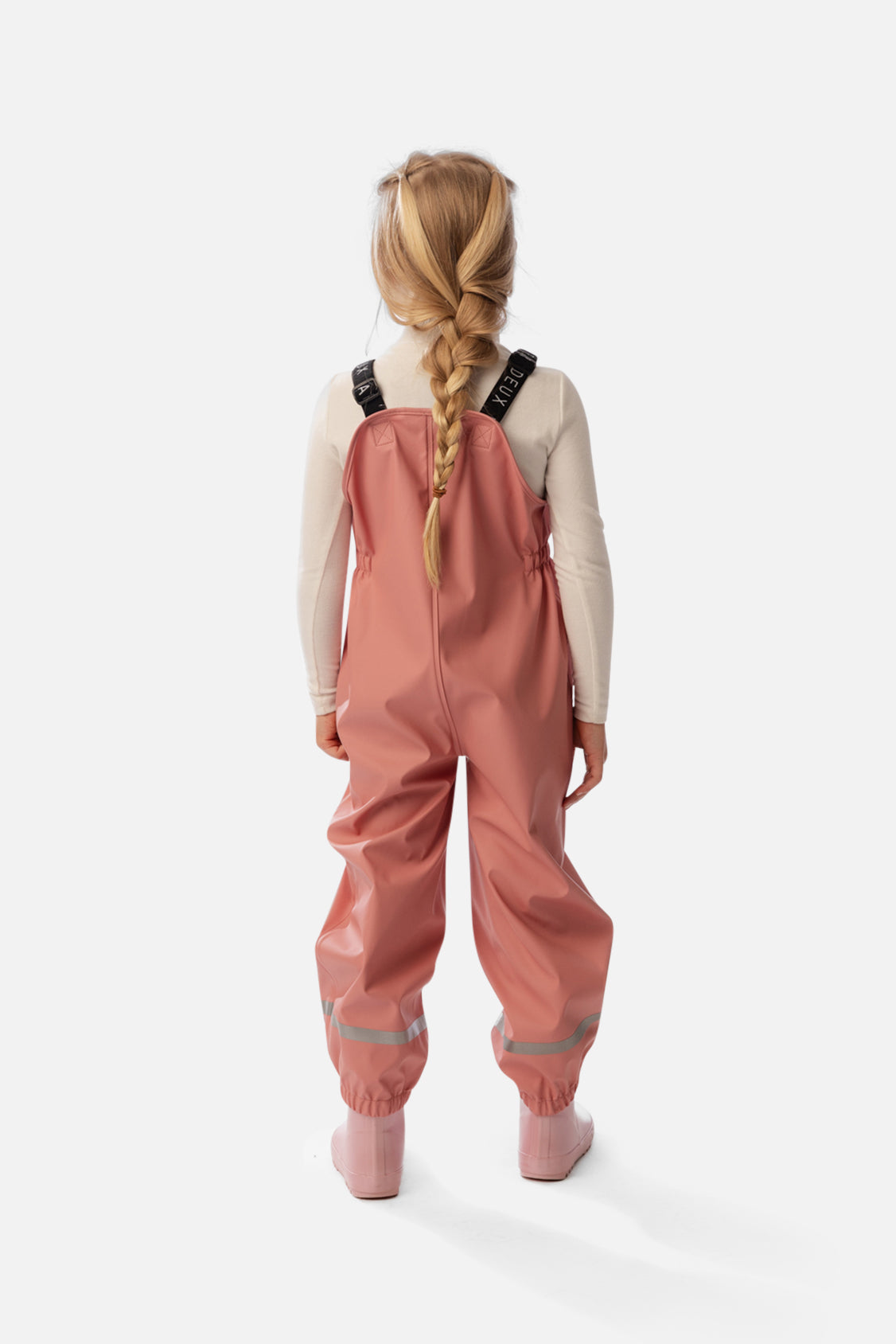 Child wearing the Deux par Deux pink rain overalls, lookbook photo 3