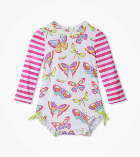 Hatley baby girl Botanical Butterflies rashguard swimsuit with pink striped sleeves and ruffle legs