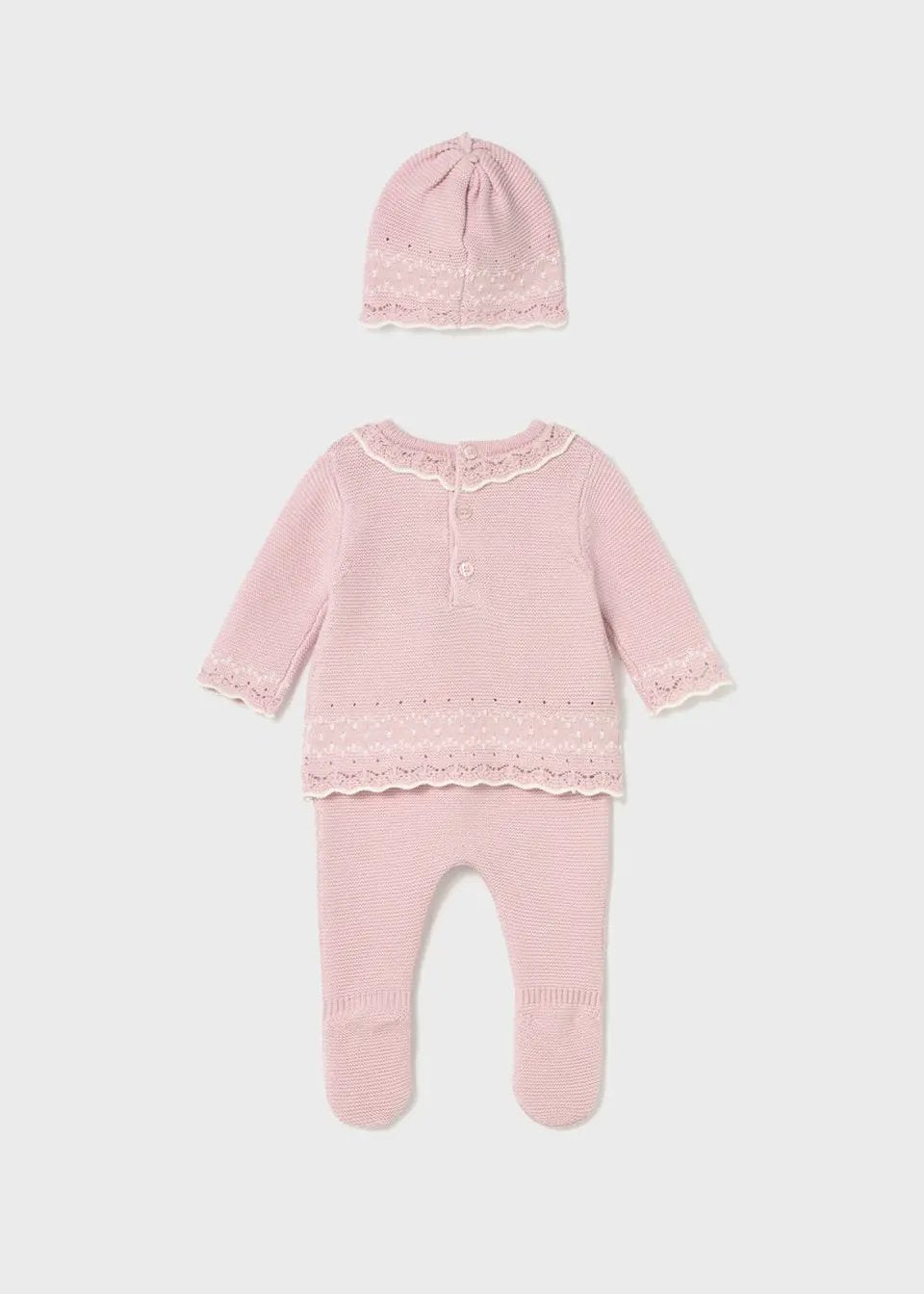 Full view of three-piece knit set for newborn girls with bow hat and footed pants.