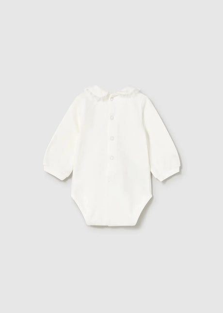 Ivory long-sleeve newborn bodysuit showing back-neck and crotch snaps