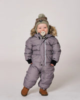 Baby wearing gray puffy snowsuit front view