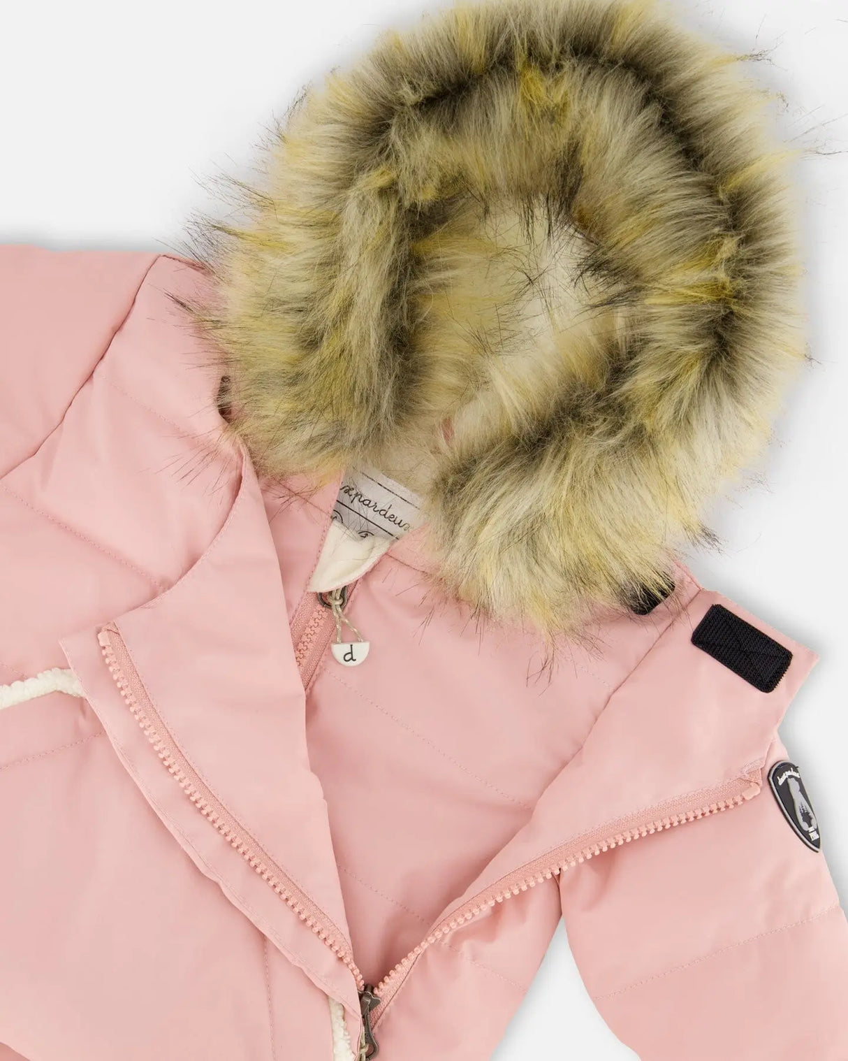 Flat lay — pink one-piece pram suit with detachable faux-fur hood, ready to ship — buy now.