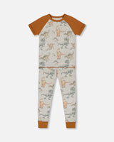 Organic Cotton Two-Piece Short Sleeve Top And Pant Pajama Set Dinosaur On Mottled And Tan Background | Deux par Deux | Jenni Kidz