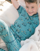 Organic Cotton Two-Piece Short Sleeve Top And Pant Pajama Set Teal With Yellow Truck | Deux par Deux | Jenni Kidz