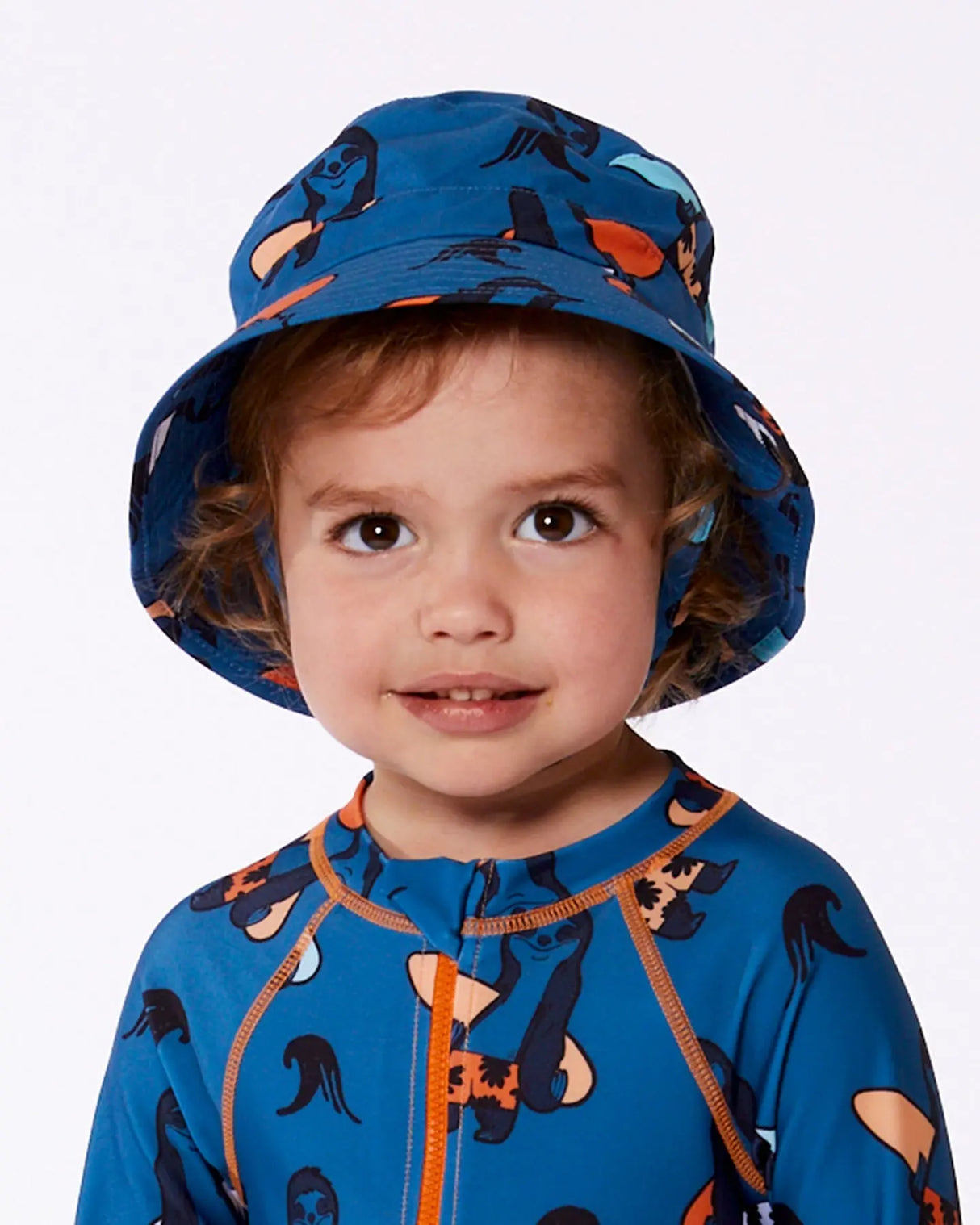 Printed Beach Hat Orange Sloths On Navy Blue | Deux par Deux | Jenni Kidz