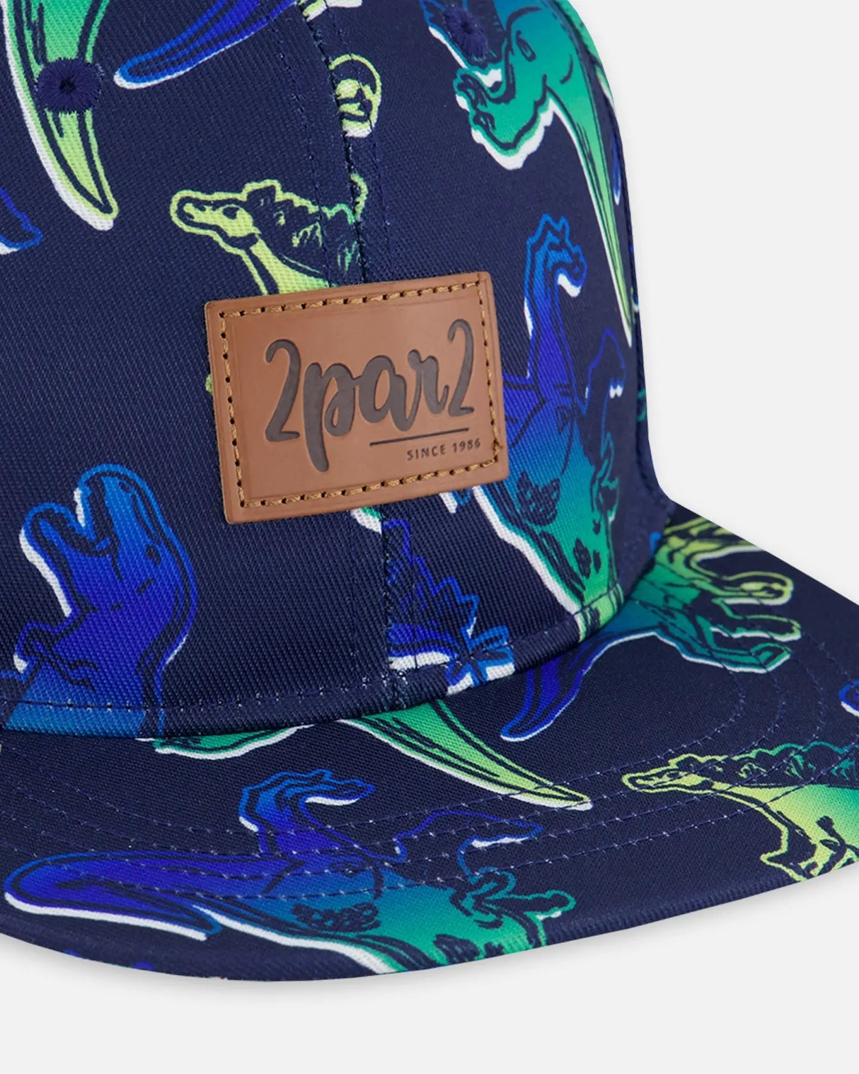 Printed Cap Blue And Green Dino On Navy | Deux par Deux | Jenni Kidz