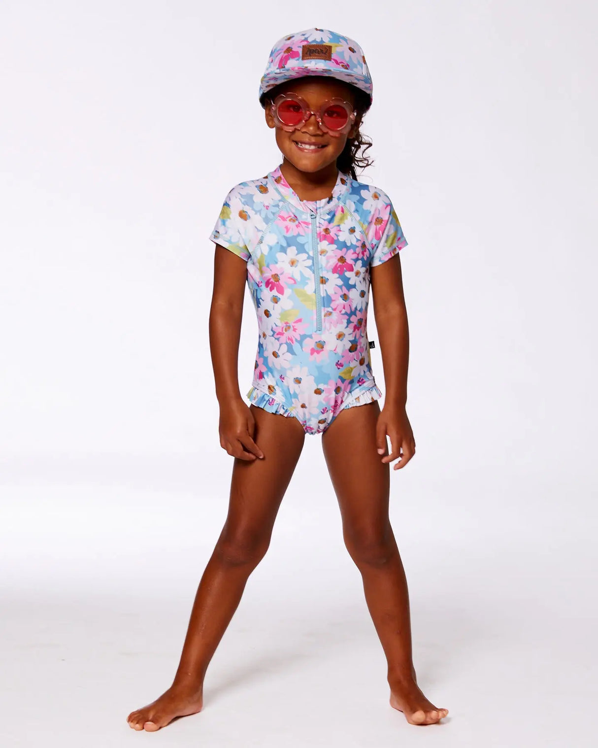 Printed Short Sleeve One-Piece Swimsuit With Frills White, Pink, And Green Flowers | Deux par Deux | Jenni Kidz