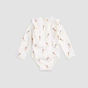 Back view of Miles The Label Creme seahorse swimsuit showing long sleeves, back zip, and one-piece design.