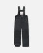 Girls black bib snow pants with Cordura knees, waterproof to −30C.