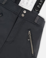 Closeup of pocket zip and suspenders, Cordura panel detail.