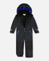 Teknik snowsuit showing adjustable pant hems
