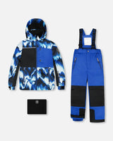 Flat lay two-piece ski suit with blue print jacket and blue/black pants.