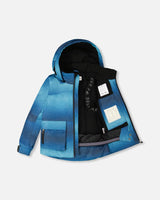 Two-piece ski suit articulated sleeves and grow cuffs