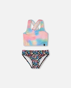 Deux par Deux girls multicolor leopard two-piece swimsuit with cross-back crop top and swim bottoms.