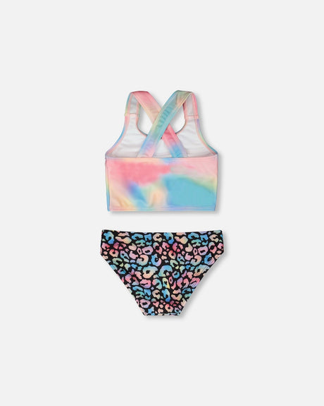 Flat view of Deux par Deux girls swimsuit showing crop top and matching leopard swim bottoms.