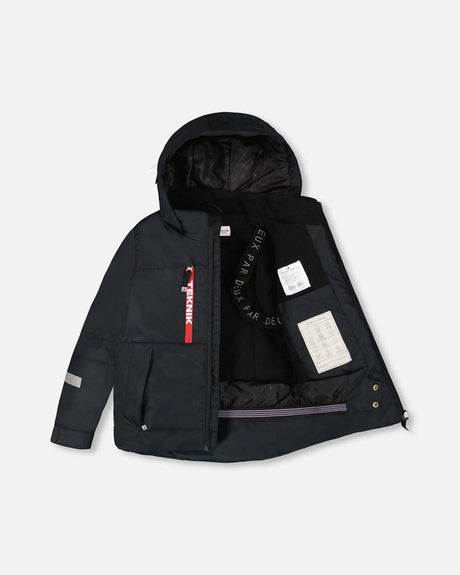 Close-up of TEKNIK jacket showing insulation and detachable hood