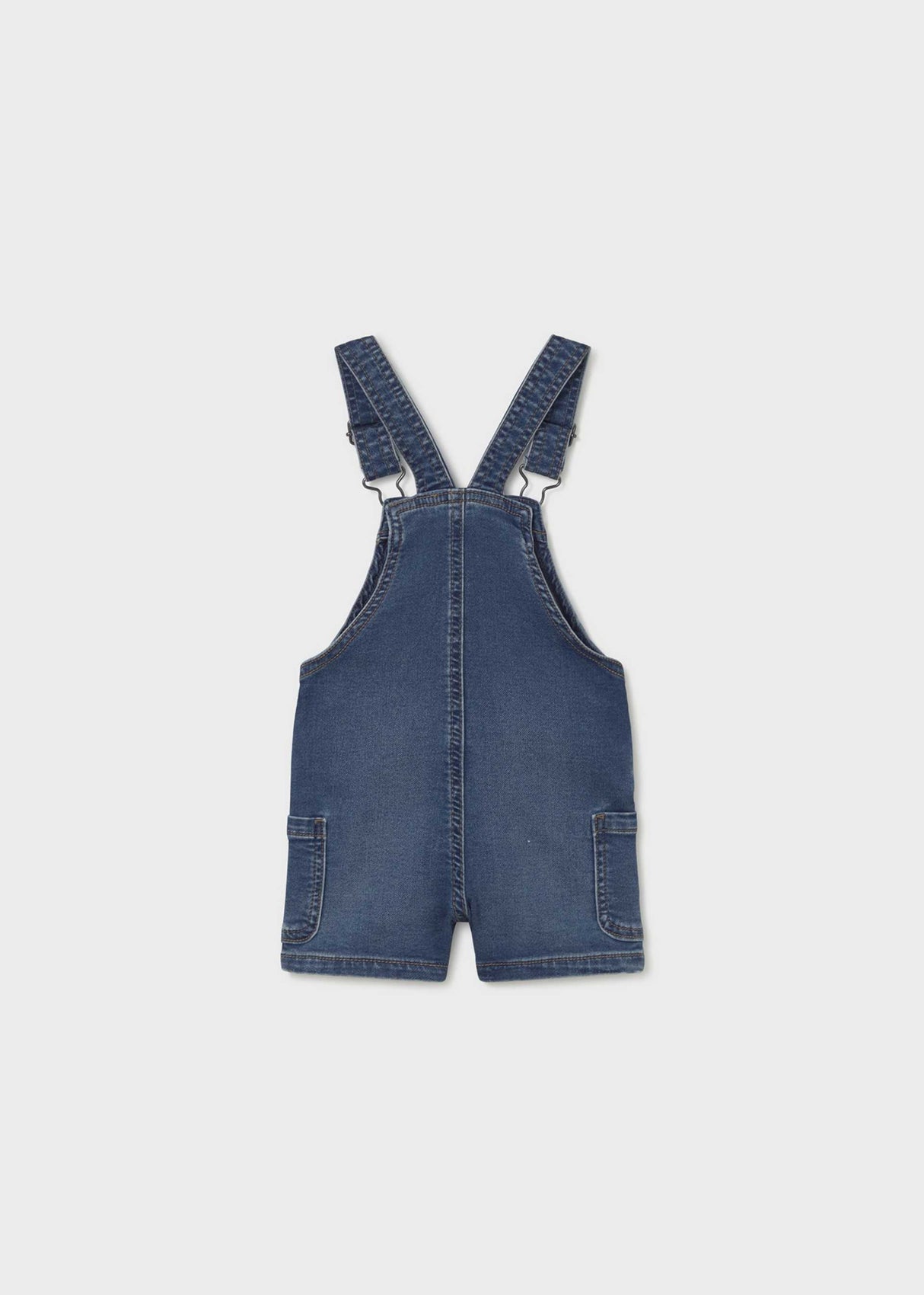 Back view of Mayoral baby denim short romper with overall-style straps and classic Blue denim.