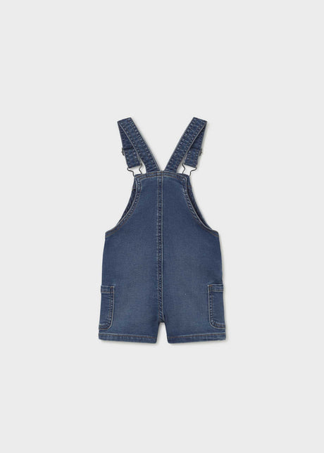 Back view of Mayoral baby denim short romper with overall-style straps and classic Blue denim.