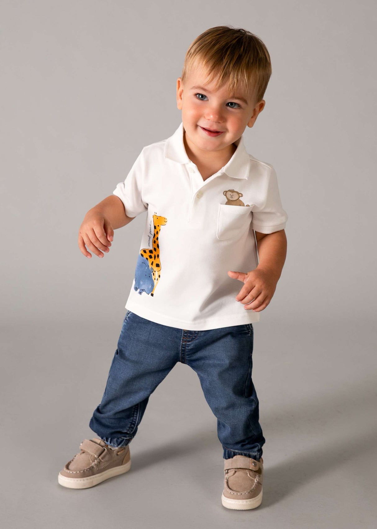 Toddler boy wearing Mayoral baby jeans with a casual tee for an everyday outfit look.