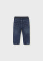 Back view of Mayoral baby boy jogger jeans showing Dark Blue denim wash and cuffed legs.