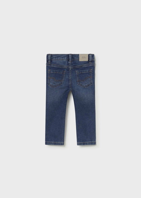 Back view of Mayoral baby slim fit jeans showing Dark Blue denim wash and pocket details.