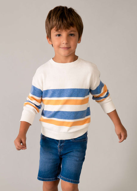 Boy wearing Mayoral denim shorts with a striped tee for a casual summer outfit.