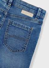 Closeup of Mayoral denim shorts showing pocket stitching, waistband detail, and stretch denim texture.