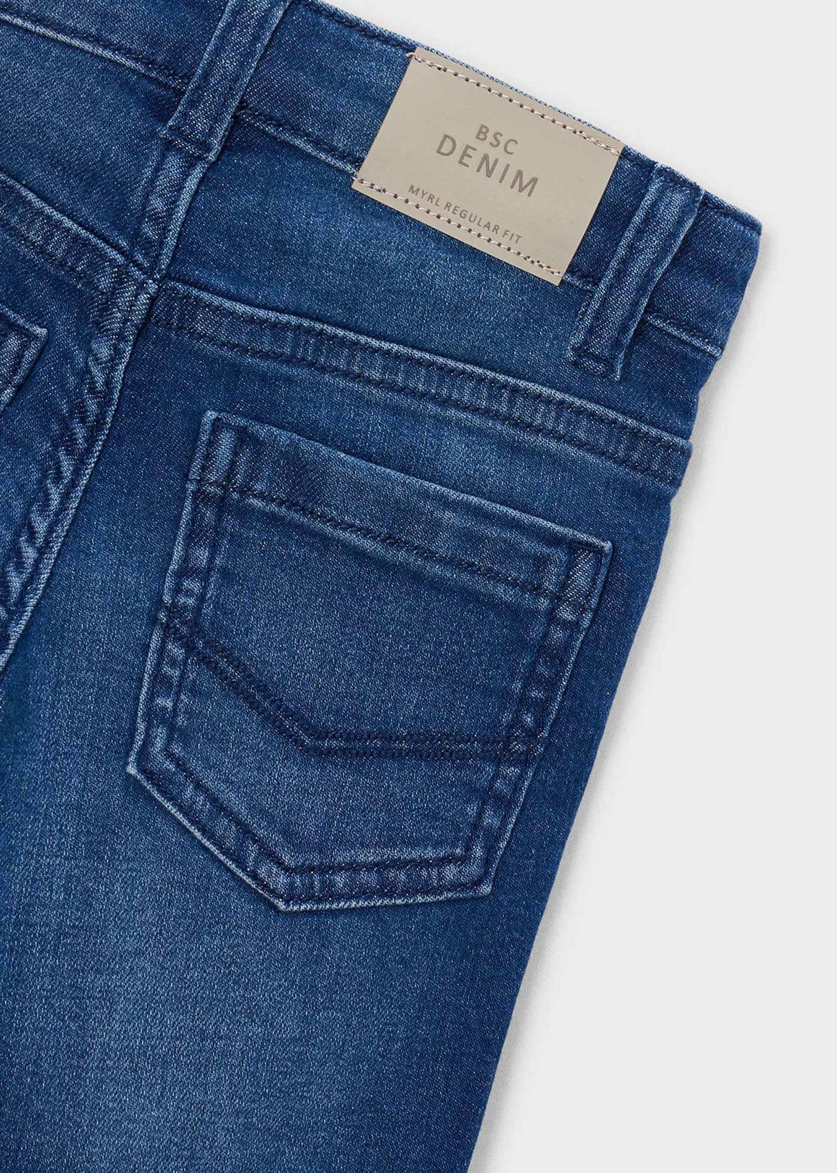 Close-up of Mayoral boys jeans showing Dark Blue denim wash, waistband, and back pocket detail.