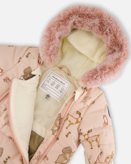 Close-up of the sherpa-lined hood and chin guard on the pink animal print snowsuit