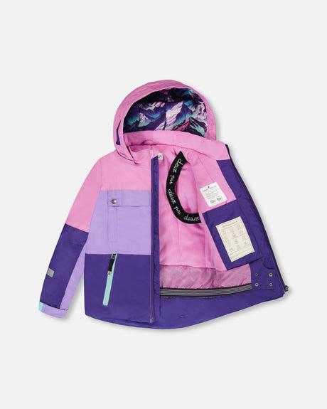 Side view of waterproof Deux par Deux purple mountain jacket with hood