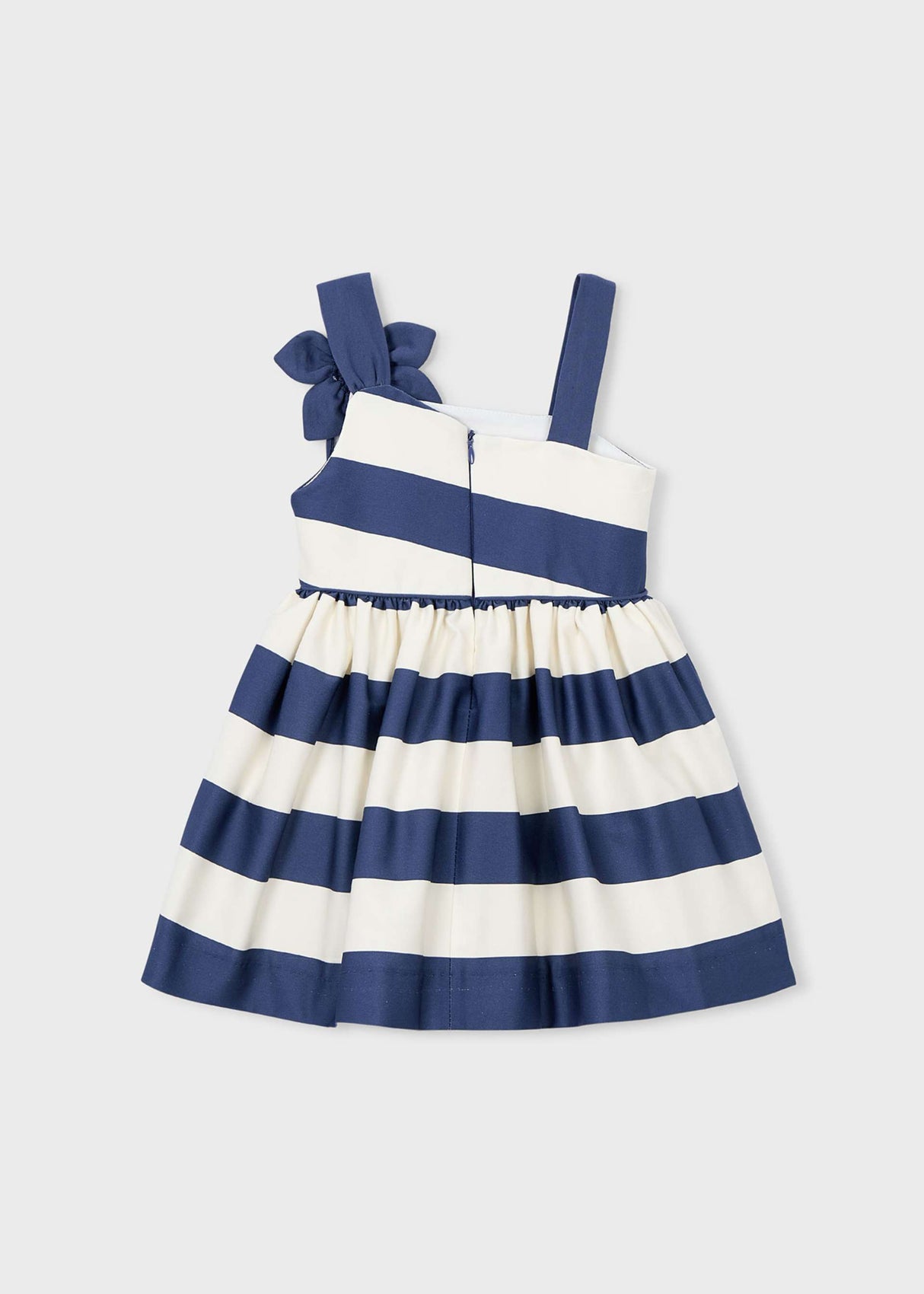 Back view of Mayoral girls striped dress showing asymmetrical straps and full skirt shape.
