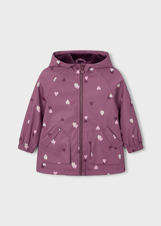 Mayoral girls hooded raincoat in Mauve with white heart print, zip front, and soft lining.