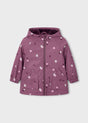 Mayoral girls hooded raincoat in Mauve with white heart print, zip front, and soft lining.