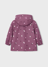 Back view of Mayoral girls Mauve heart print hooded raincoat for wet-weather layering.
