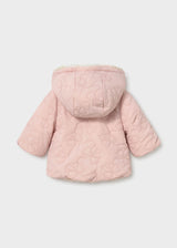 Back view of Mayoral baby girl Pink reversible puffer jacket with hood and cozy padded shape.