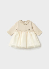 Mayoral newborn baby girl tulle dress in Ivory with long sleeves, layered skirt, and cotton lining.