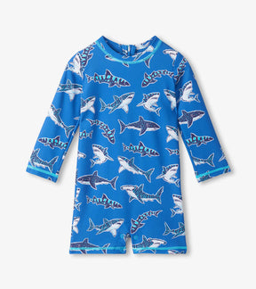 Hatley baby boy UPF50+ rashguard swimsuit in Blue with Patterned Sharks print and long sleeves.