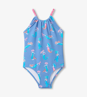 Hatley girls UPF50+ one-piece swimsuit in Blue/Pink with mermaid print, gathered front, and adjustable straps.